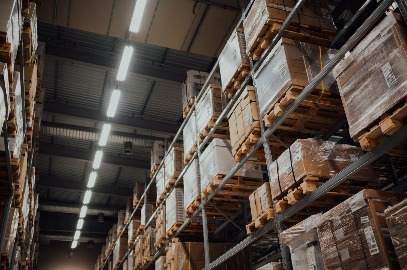 Palletized cartons on warehouse racking ready for dispatch